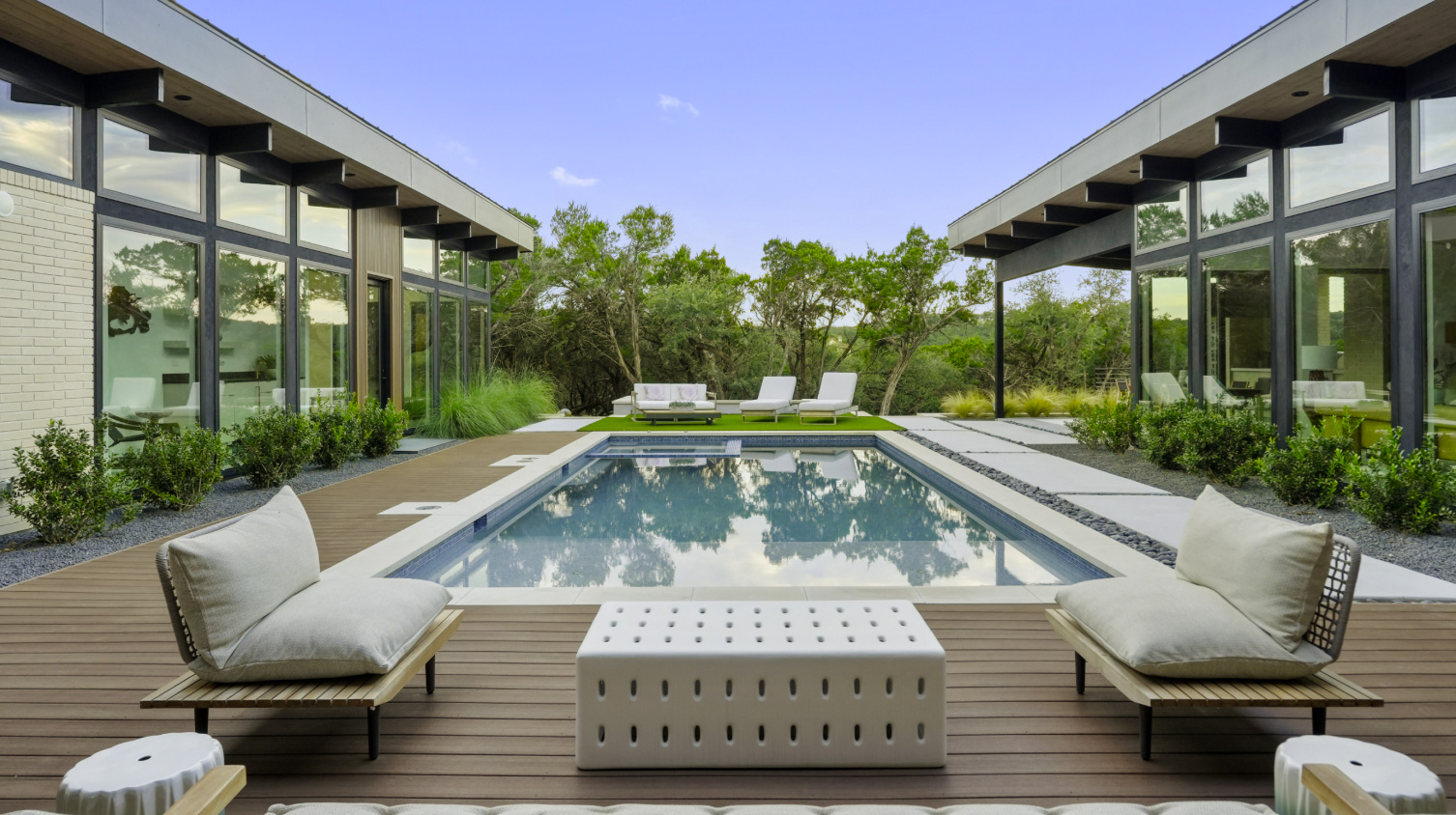 Pool and architectural setting featured by Southwest Pool & Outdoor Living